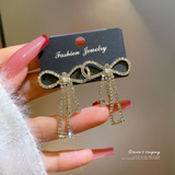 PQT-985 Touch Of Glamour To Your Look With These Bow Shape Zircon Korean Earrings – Color Golden